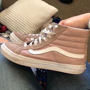 Lightly worn light pink high top vans.